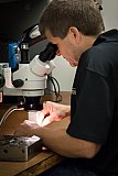 Polishing details under a  microscope - Moldmaking Processes